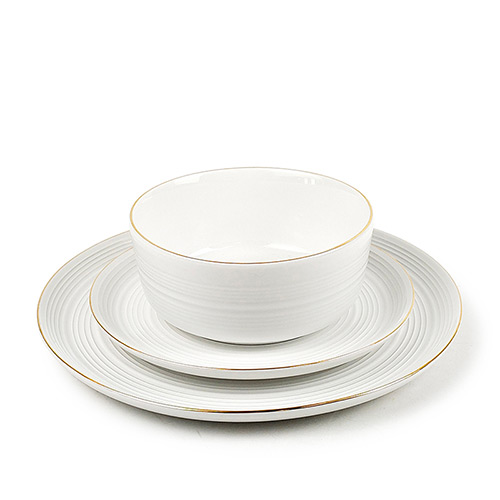 white porcelain tableware with gold rim