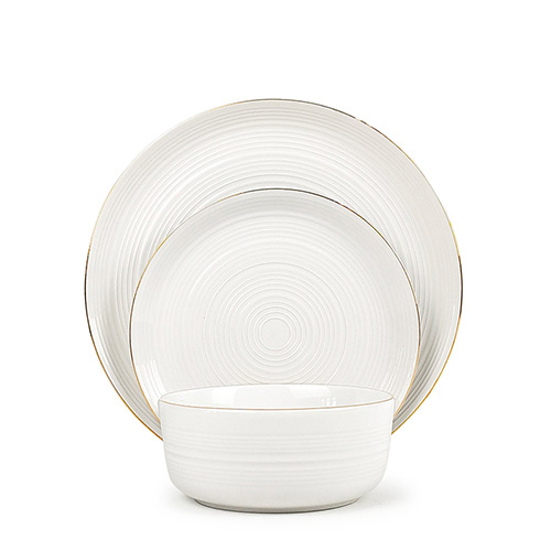 white porcelain tableware with gold rim