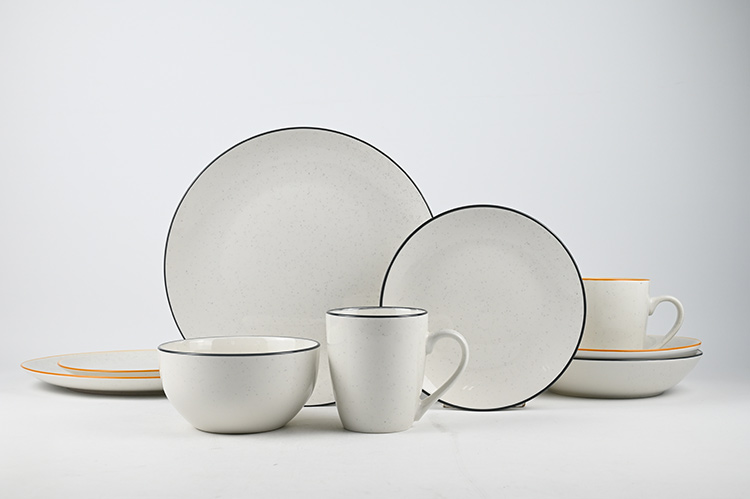 white porcelain dinner set with speckle and rim