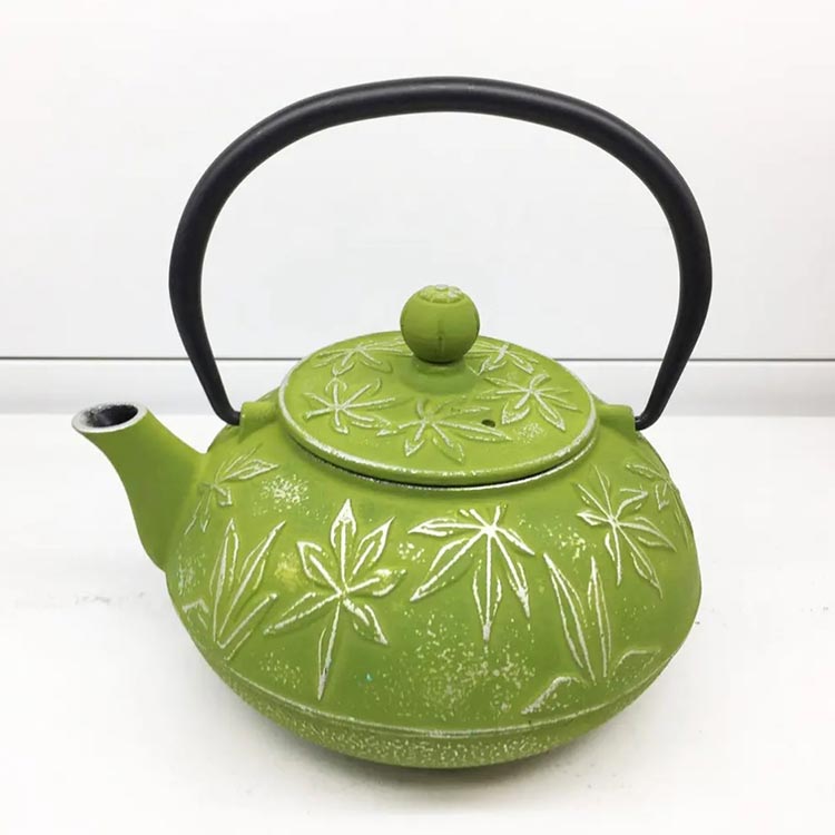 green enamel cast iron teapot with infuser