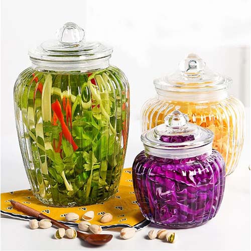 pumpkin-shaped ribbed glass storage jar with lid