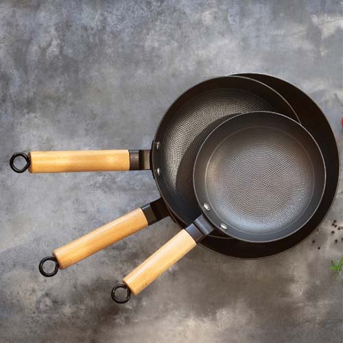 thin cast iron fry pan with wood handle