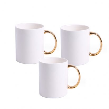 white ceramic coffee mugs with gold handles