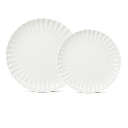 white ceramic plates with flower petal