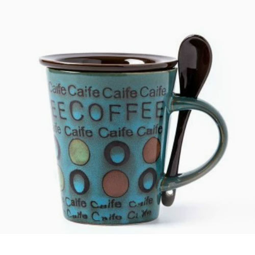 green ceramic cup with spoon and lid