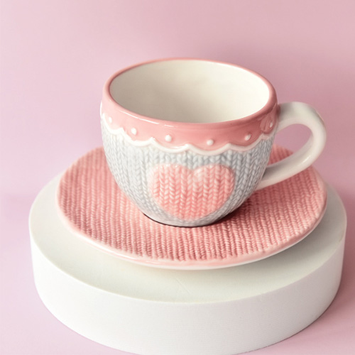 ceramic coffee mug with emboss heart design